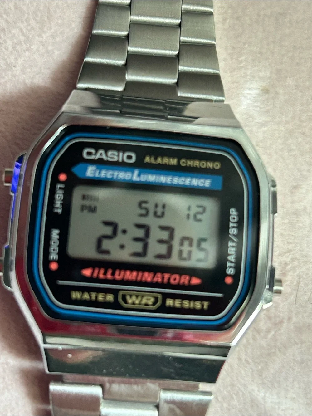 Casio Silver Digital Watch with Black and Blue Accents